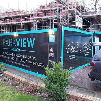 Parkview construction site hoardings advertising a new development