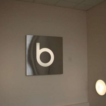 illuminated wall sign with LED backlighting