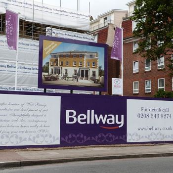 Large hoarding, flags and scaffolding banner